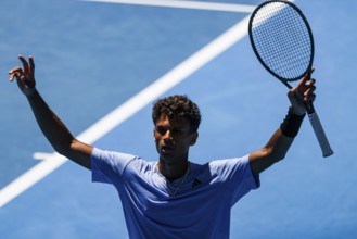 MELBOURNE, AUSTRALIA, JANUARY 11: Gabriel Diallo of Canada on his way to beating Pierre-Hugues