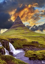 The famous mountain in Iceland is Kirkufell. At the foot of the mountain cascading waterfalls
