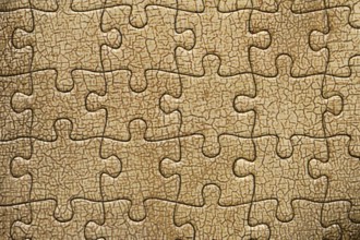 Background of cracked oil paint from a jigsaw