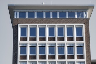 Facade of an modern large house, wall with windows
