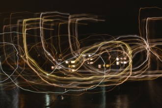 Light painting, light trails and reflections at night - long exposure