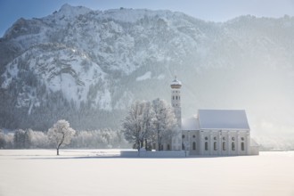 St. Coloman with trees in wintery landscape, Alps, Germany, Europe