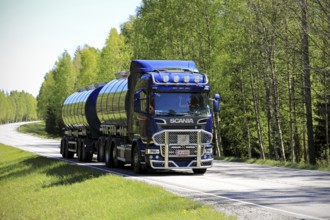 TENHOLA, FINLAND, JUNE 4, 2017: Dark blue Scania R580 tank truck with bull bar of Tomppa Tuomisto