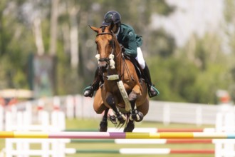 Abdulrahman Alrajhi from Saudi Arabia and riding Heartbeat W, compete in the 1.60m Grand Prix