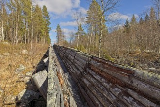 Nellim log flume in spring with clouds in the sky, Nellim, Inari, Lapland, Finland, Europe