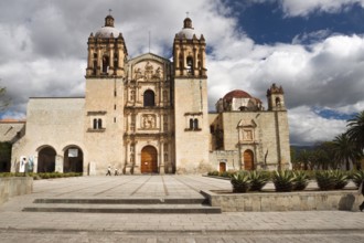 Church of St Domingo founded in 1575 is ornate plaster statues and colored stucco flowers. Oaxaca,