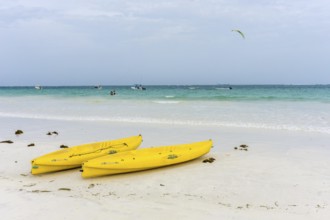 Yellow boats at the white beach of Mombasa in Kenya