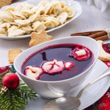 Red barzcz with uszka a polish christmas soup