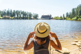 Woman tourist in the beautiful landscape at Mummelsee, Black Forest, Germany, Europe
