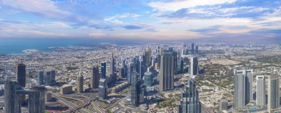 UAE, Dubai panoramic skyline view of city financial downtown and Dubai Mall.