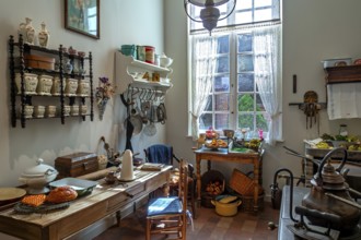 Kitchen inside 18th century clergy house, parsonage, rectory Schriek at recreated village in open