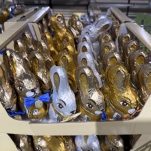 Display on retail shelf of wholesale chocolate Easter bunnies chocolate Easter bunnies wrapped in