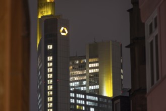 The lights in the offices of the Commerzbank Tower in Frankfurt am Main shine in the evening, New