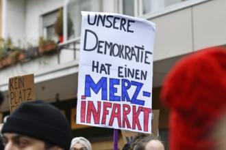 Heidelberg, Germany - February 12th 2025: Protest sign against CDU politican Friedrich Merz at