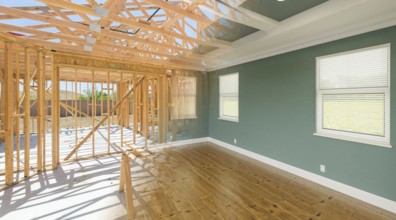 Before and after interior of house wood construction framing and finished build
