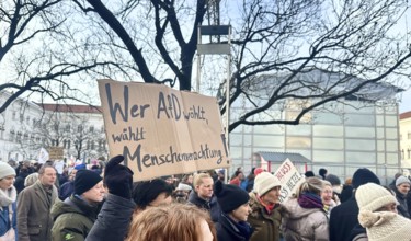 Sign Who votes for AFD, votes for contempt for humanity, Crowd at the demonstration against