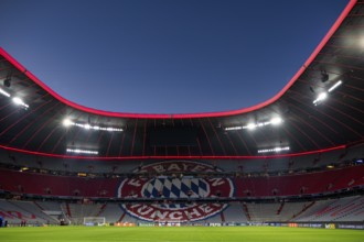Evening match Allianz Arena, interior, illuminated, logo FC Bayern Munich, blue hour, UEFA