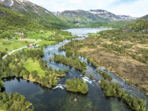 Gaularfjell mountain crossing following river Gaula and chain of lakes, early spring, aerial view,