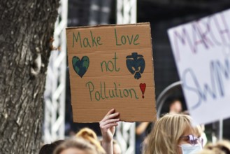 Heidelberg, Germany, 24th September 2021: Sign held up by young woman saying 'Not cool' at Global