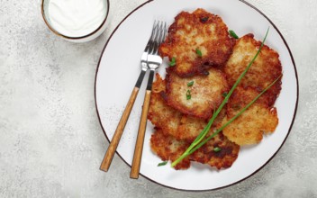 Potato pancakes, pancakes with sour cream, Belarusian dish, homemade, no people