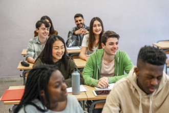 Multi ethnic university students attending a lesson and smiling, concept of education and