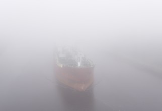 Tanker JAZZ sailing in fog in the Kiel Canal, Kiel Canal, NOK, Schleswig-Holstein, Germany, Europe