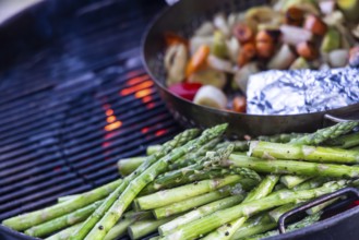 Barbecue, kettle grill with vegetarian and vegan barbecue grills such as grill pan and green