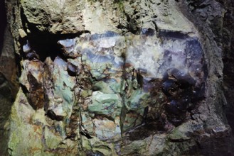 Green jasper with rock crystal in the visitor gallery of the Steinkaulenberg gemstone mines,
