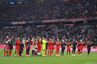 FC Bayern Munich FCB players celebrate victory with fans in the fan curve, Allianz Arena, Munich,