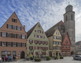 Historic residential and commercial buildings, on the right the late Gothic hall church of St
