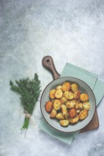 Baked new potatoes, with butter and dill, homemade, no people