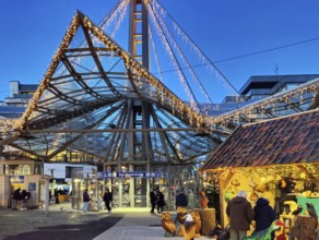 Christmas market at the Reinoldikrche underground station in the evening, Dortmund, Ruhr area,