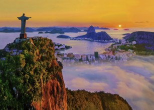 Corcovado 710m with Christo Redentor statue above Botafogo Bay with Sugar Loaf 396m at sunrise and