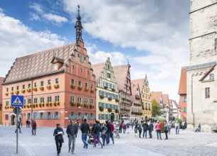 DINKELSBUEHL, GERMANY - SEPTEMBER 27: Tourists in the old town of Dinkelsbuehl, Germany on