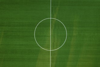 Aerial photographic documentation of an empty green football pitch