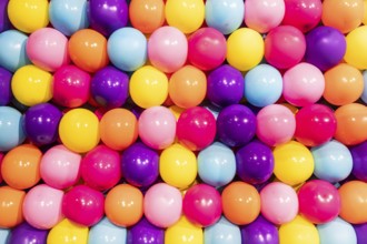 Colorful balloons background, real photo, concept of celebration, party, happy, surprise