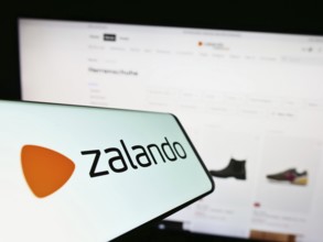 Stuttgart, Germany, 01-16-2023: Cellphone with logo of German e-commerce company Zalando SE on