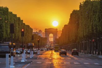 Paris France, city skyline sunset at Arc de Triomphe and Champs Elysees