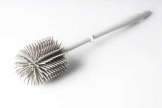 modern toilet brush with silicone bristles on white background