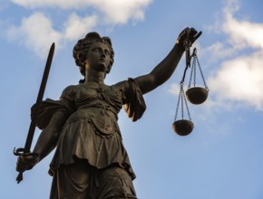 Justitia (Lady Justice) sculpture on the Roemerberg square in Frankfurt, built 1887