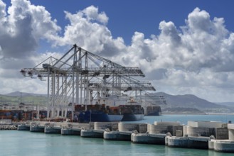 Tangier, Morocco, 1 April, 2024: container ships being unloaded and loaded at Tanger Med port in