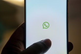 WhatsApp logo messenger app on a mobile phone