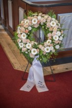 Sympathy Wreath at a funeral in a church
