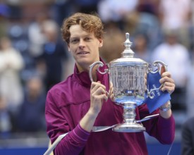 Tennis player Jannik Sinner of Italy holding the trophy during the presentation at the US Open 2024