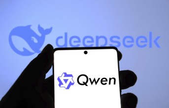 Alibaba Qwen 2.5 logo is displayed on smartphone