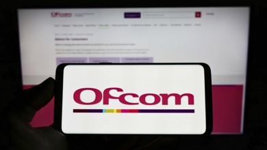 Stuttgart, Germany, 06-04-2022: Person holding cellphone with logo of British authority Office of