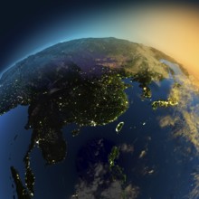 Night view of Asia from the satellite to the glowing lights of towns on the sunrise from the east