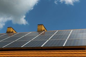 Roof of a farmhouse with solar cells