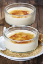Two creme brulee in glass bowls