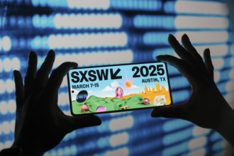 In this photo illustration, the South by Southwest (SXSW) 2025 logo is displayed on a smartphone